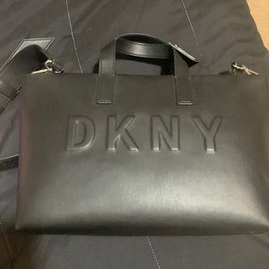 never worn dkny bag with strap on it